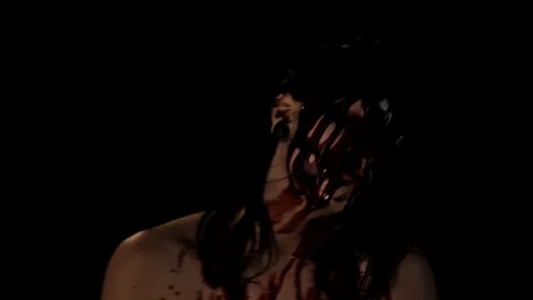 Bloodied face jerking all around Stock Footage 99072404