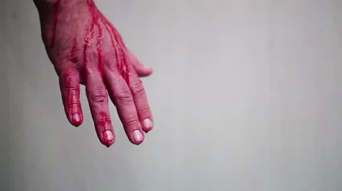 Bloody hand on white background Stock Footage 47135859