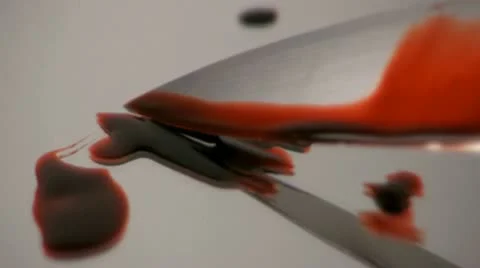 Bloody knife in a pool of blood Stock Footage