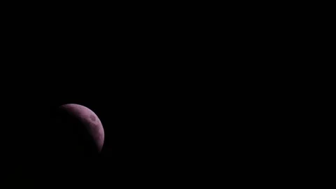 Bloody red moon eclipse time lapse Stock Footage 170976921