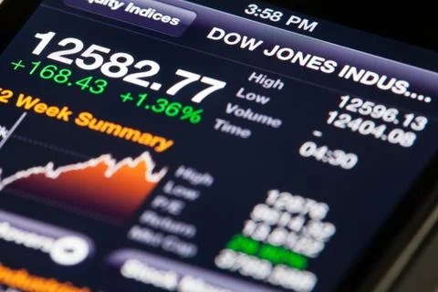 Bloomberg app on iPhone with market data Stock Photos