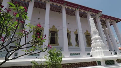 Blooming tree in the temple yard, Wat Mahannapharam Worawihan, Bangkok Stock Footage 145897317