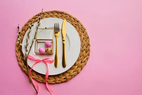 Blooming willow, easter egg on plate and tableware Stock Photos