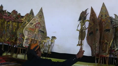 Blora, central Java, Indonesia - June 22th, 2022 : A puppeteer (Dalang) Stock Footage 202119395