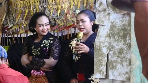 Blora, central Java, Indonesia - June 22th, 2022 : Sinden accompanies the Stock Footage 202119398