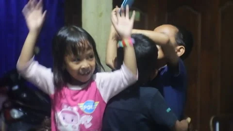 Blora, central java, Indonesia, March 30, 2022: little children dancing in Stock Footage 176920964