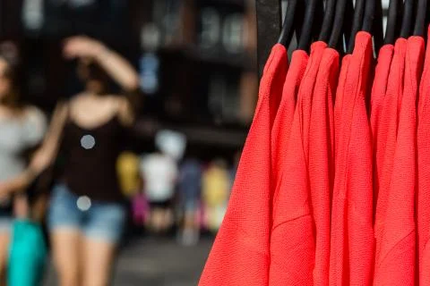 Blouses on hangers Stock Photos
