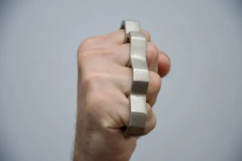 Blow brass knuckles from the bottom up, causing serious bodily Fotos de archivo