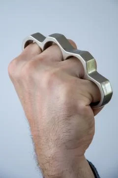 Blow brass knuckles from the bottom up, causing serious bodily harm. Photos