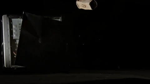 Blow of a heavy hammer onto a desktop computer, isolated, slow motion shot Stock Footage 274490776