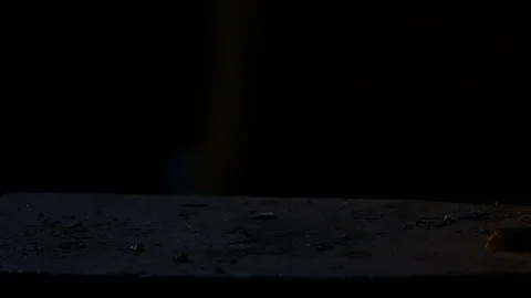 Blow on hot metal close-up 库存影片 69859341