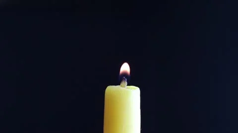Blow out the candle in the church. closeup Stock Footage