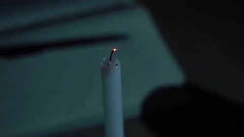 Blow out a candle Stock Footage 156280793