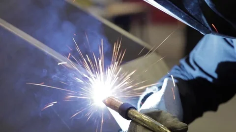 Blow torch by engineer in metalwork close up large sparks Stock Footage 75944658