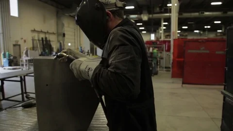Blow torch by metal worker engineer medium shot Stock Footage 75944629