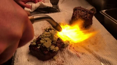 Blow Torching Meat in Restaurant Video stock 82316464