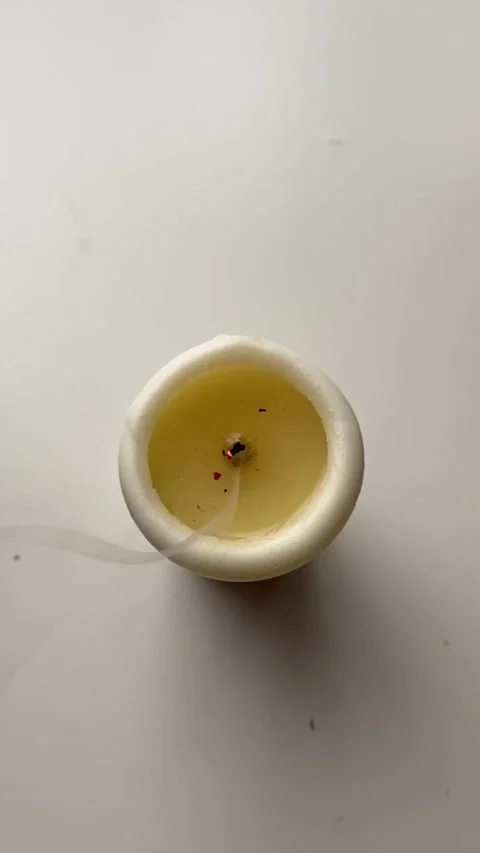 Blow of the wax candle Stock Footage 203908826