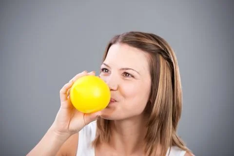 Blowing balloon Stock Photos