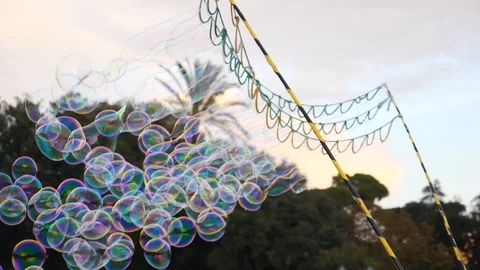 Blowing Big Soap Bubbles In The Air. Stockbeeldmateriaal 98704622