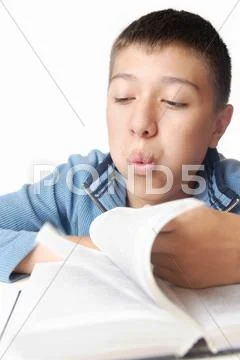 Blowing on the book pages Stock Photos