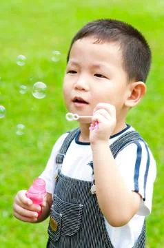 Blowing bubbles Stock Photos