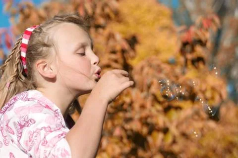 Blowing bubbles Stock Photos