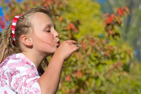 Blowing bubbles Stock Photos