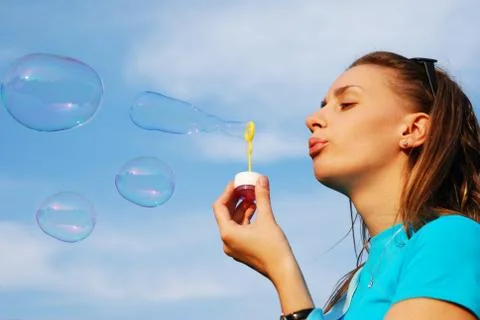 Blowing bubbles Stock Photos