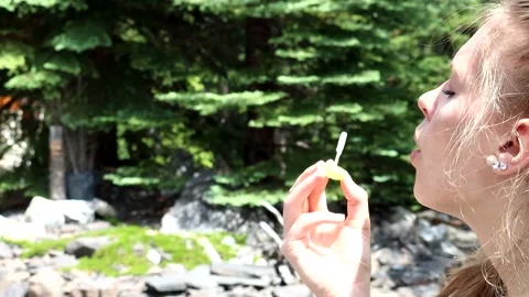 Blowing Bubbles - slow motion - 6 sec Stock Footage 136668556