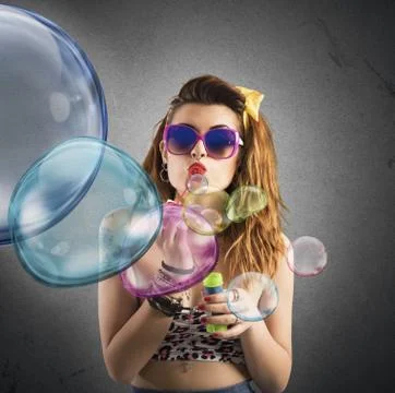 Blowing colored bubbles Stock Photos
