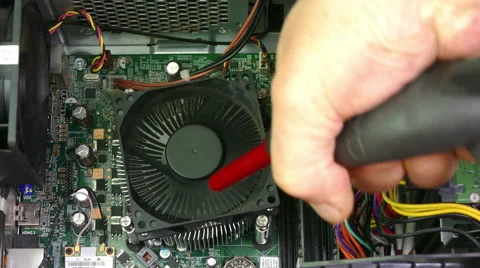 Blowing dust from the inside of a PC. Video stock 68703057