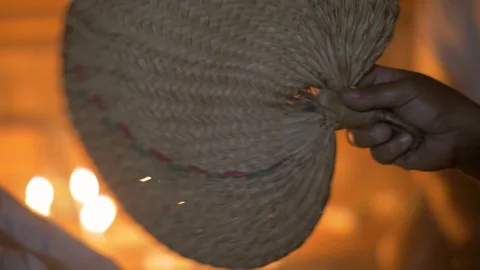Blowing fan while aroma therapy at healing ceremony. Traditional healing ritual Stock Footage 103401101