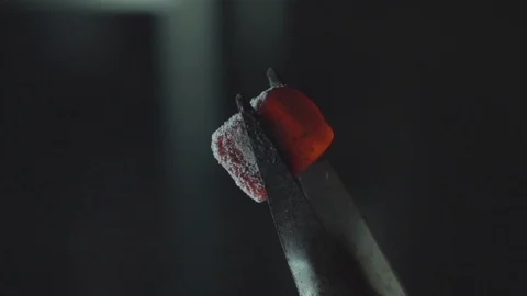 Blowing of hookah coal in slow motion Stock Footage 102529127