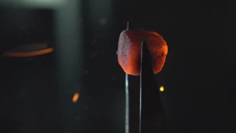 Blowing of hookah coal in slow motion Stock Footage 102529197
