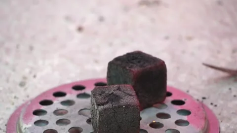 Blowing of hookah coal in slow motion. Stock Footage 247117672