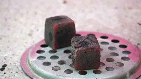 Blowing of hookah coal in slow motion. Stock Footage 252885856