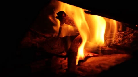 Blowing onto hot coal Stock Footage 142466707