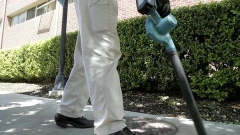 Blowing Leaves Off Sidewalk Stock Footage 100074877