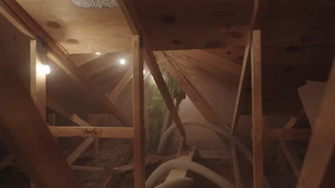 Blowing in Loose Cellulose Insulation in to Home Attic Weatherization Stock Footage 340923422