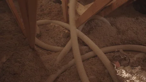 Blowing in Loose Cellulose Insulation in to Home Attic Weatherization Stock Footage 340923653