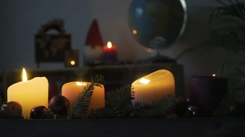 Blowing out advent candles one by one, Christmas, 4k Stock Footage 144540586