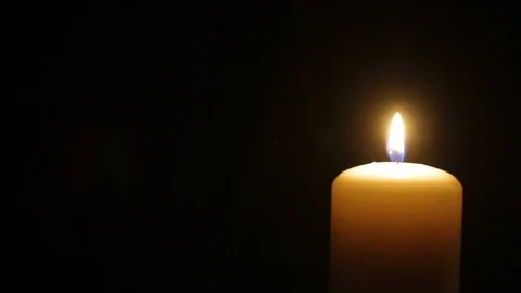 Blowing Out Candle in Darkness Stock Footage 102522361