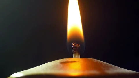 Blowing Out A Candle macro shot Stock Footage 234788879