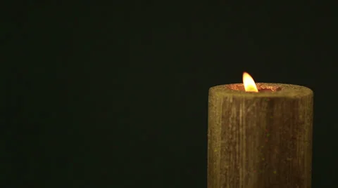 Blowing out a christmas candle Stock Footage 30697924