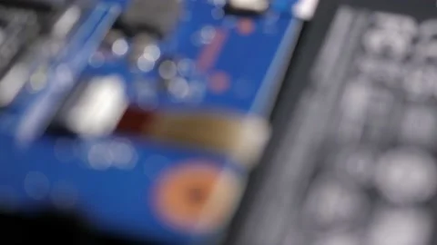 Blowing Out Computer Components - Macro Stock Footage 220737197