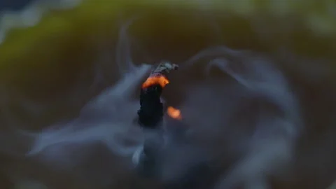 Blowing out an old candle Stock Footage 203973666