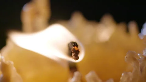 Blowing out an old candle Stock Footage 203973678