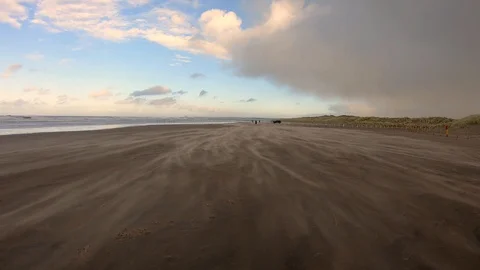 Blowing Sand over a Beach Stock Footage 124773681