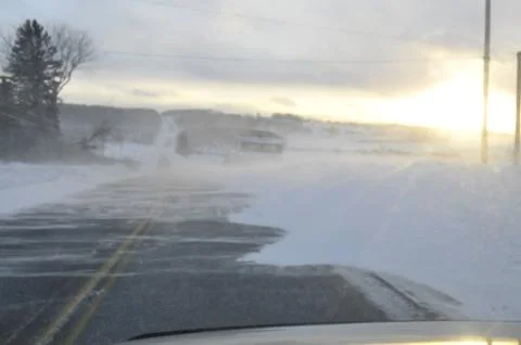 Blowing snow causing white-out conditions in northern Maine Stock Photos