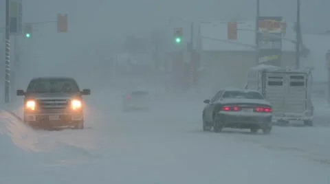 Blowing Snow on Road in Blizzard With Light Traffic 스톡 동영상 59902036